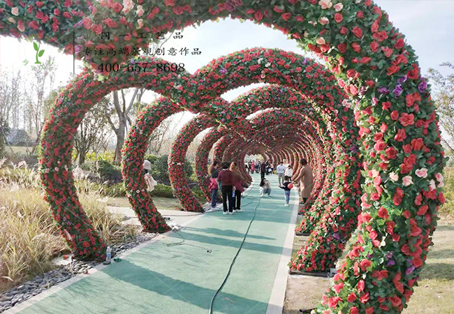 仿真绿雕绢花拱门现场效果 仿真绿雕绢花拱门现场效果